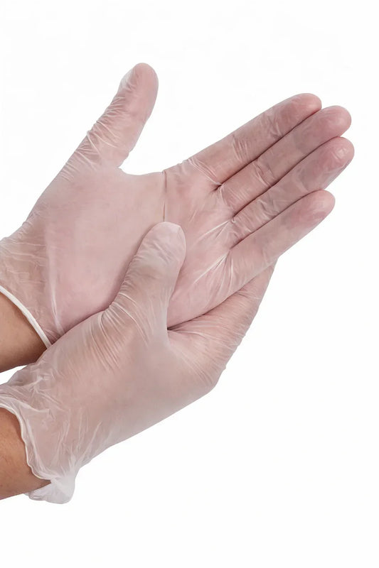 Close-up of hands wearing disposable transparent gloves, clean background