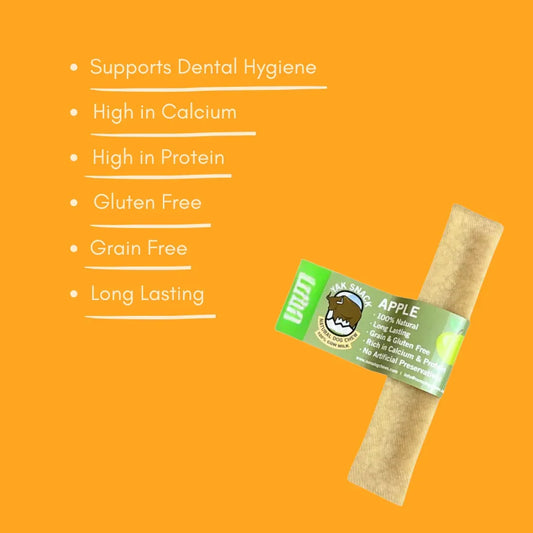 Apple yak dog chew on orange background highlighting natural, gluten-free, dental treat benefits