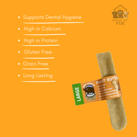 Large Peanut butter yak dog chew on an orange background, featuring text about benefits.