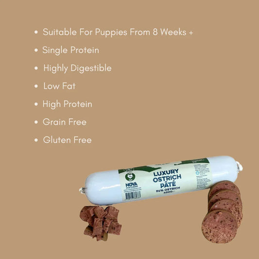 Luxury ostrich pâté dog treat roll, sliced, with product benefits listed on beige background.