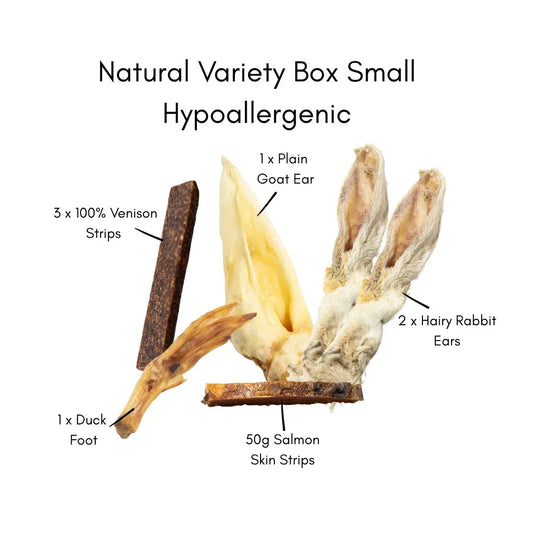 Natural Variety Box Small hypoallergenic dog treats with venison strips, goat ear, hairy rabbit ears, duck foot, and salmon skin strips, 100% natural pet snacks.