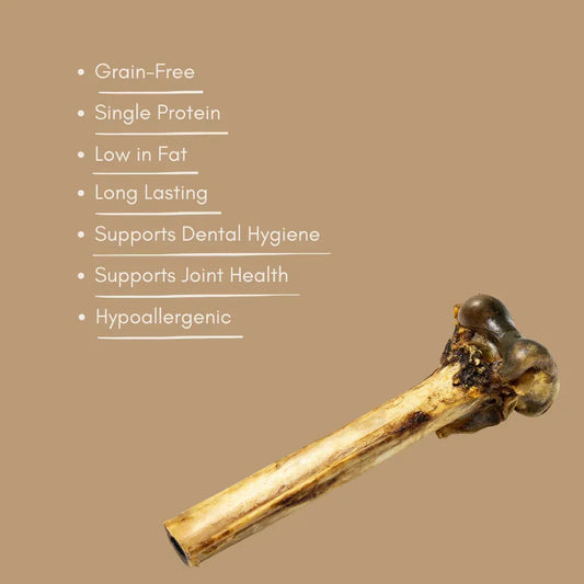 Natural ostrich bone dog treat on tan background with key benefits listed, House Of PDB