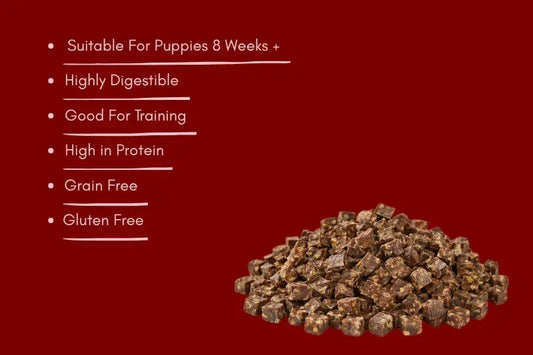 Pile of natural beef dog training treats with key benefits on red background, House Of PDB