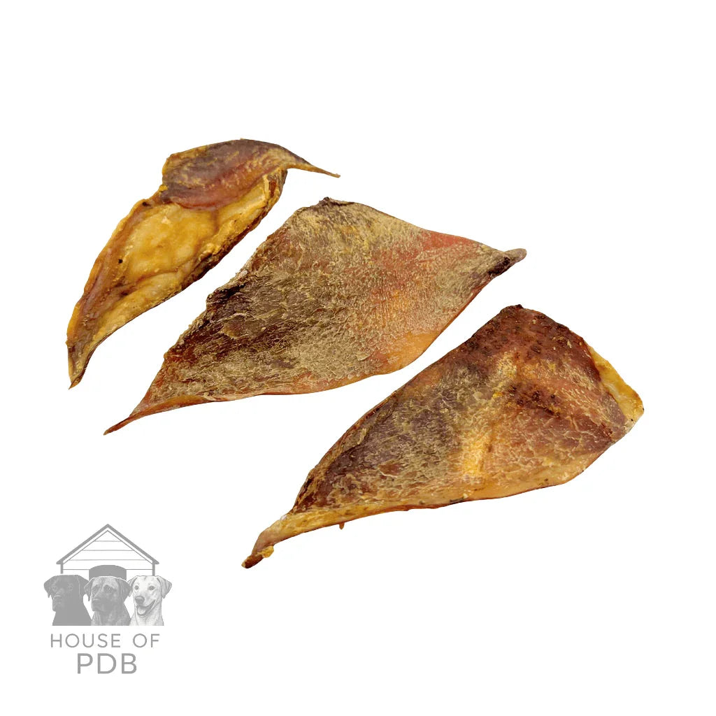 Three dried beef lung dog chews on white background with House of PDB logo