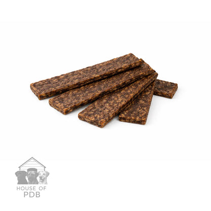 Dog treats stacked on a white background with 'House of PDB' logo.