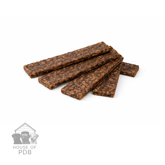 Dog treats stacked on a white background with 'House of PDB' logo.