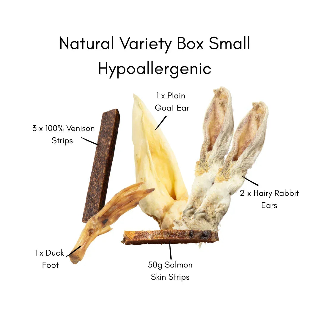 Natural Variety Box Small hypoallergenic dog treats with venison strips, goat ear, hairy rabbit ears, duck foot, and salmon skin strips, 100% natural pet snacks.
