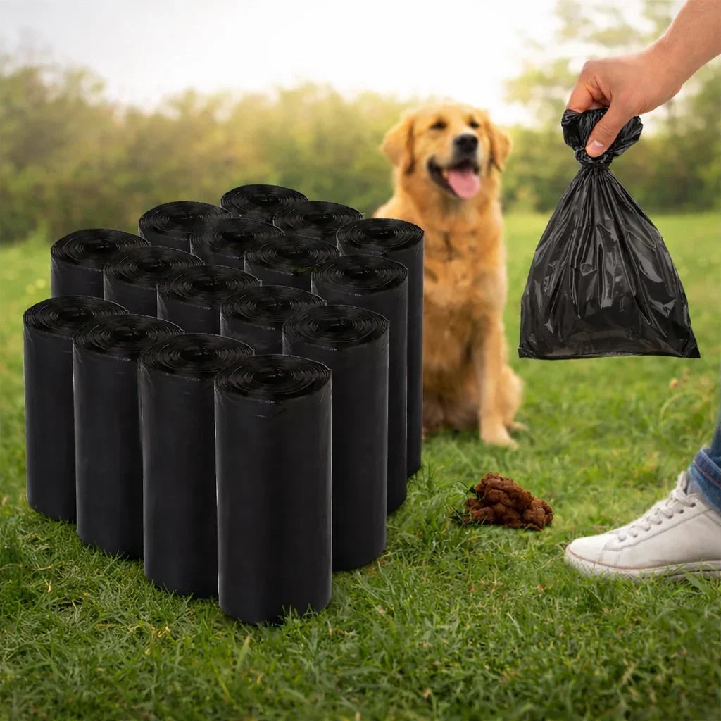 Black dog poo bag rolls on grass with golden retriever and waste pickup, House Of PDB.
