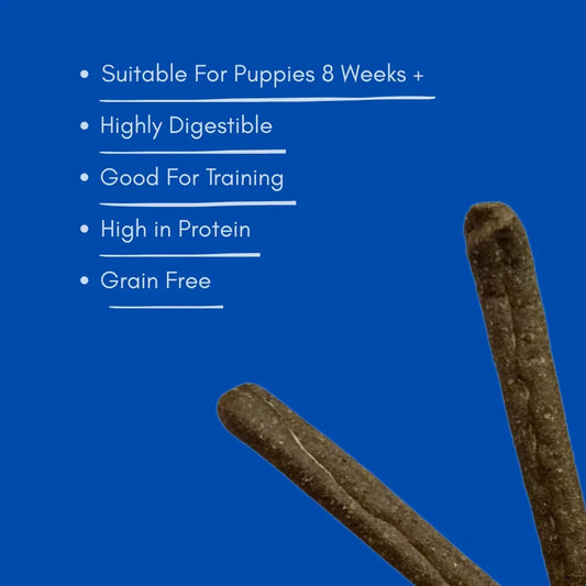 Two salmon dog sausages on blue background, key benefits listed, House Of PDB natural treat