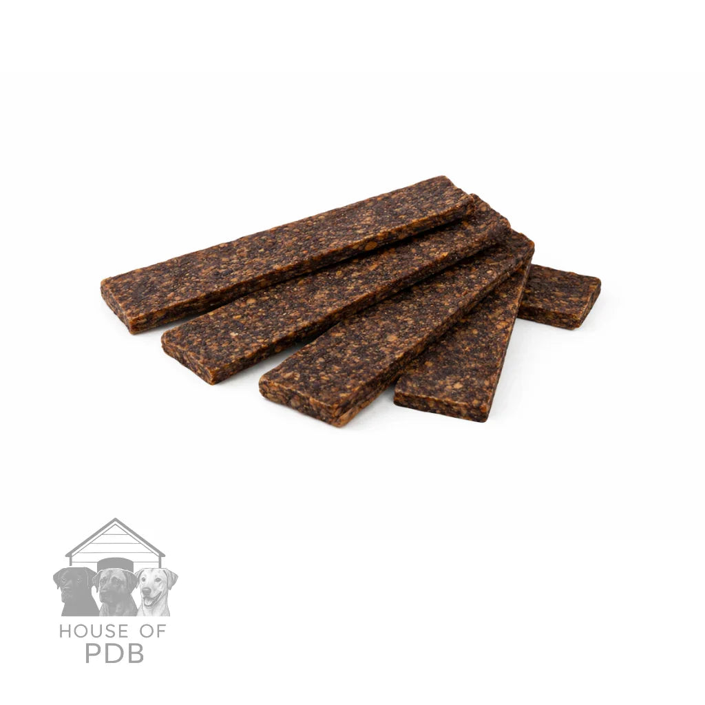 Stack of brown dog treats on a white background with 'House of PDB' logo.