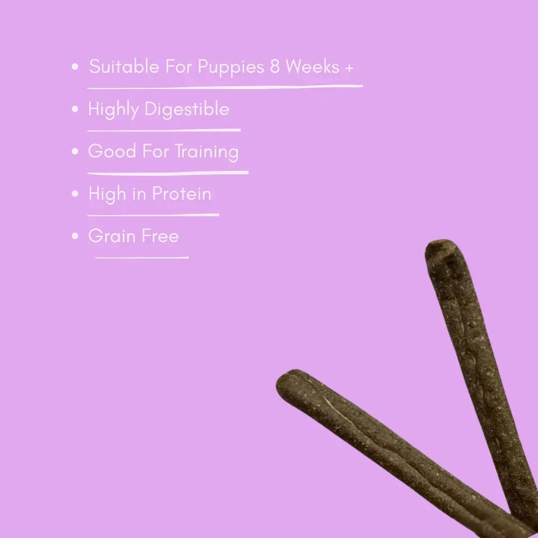 Single protein partridge sausage dog treats on purple background with key benefits listed